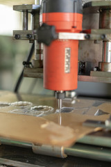 DIY Mini CNC Machine for 3D carving. Process of 3D cutting, machining and sculpting. Cutting 3D text on the workpiece