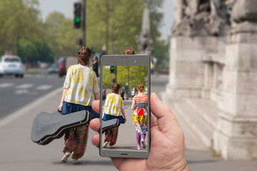 Touch screen smartphone in a hand