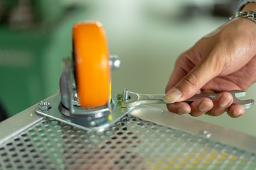 Trolley wheels made of antistatic resin for use in the factory.