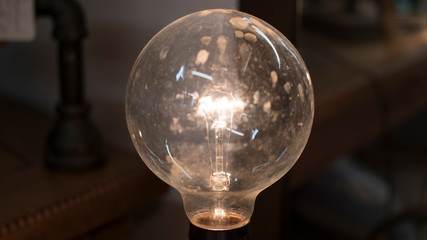 Old Round Dirty Bright Light bulb Less Bright