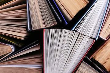 Fototapeta premium Books are randomly standing. Book background, knowledge is power.