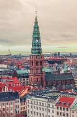 Obraz premium Kunsthallen Nikolaj (the Nikolaj Contemporary Art Center) which occupies the former St. Nicholas Church. Copenhagen, Denmark