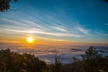 morning and sunrise on the winter season over the mountain layer at chingmai , thailand.