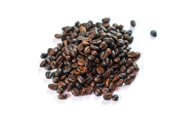 Coffee beans from top on white background.