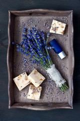 Piece of natural soap with lavender flowers