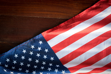 Obraz premium America flag on wooden table.