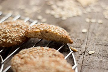 Oatmeal cookies on tray on rustic wooden table