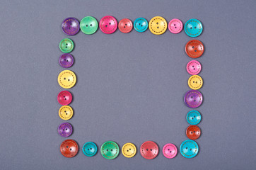 Sewing buttons composition. Needlework concept background. Flat lay