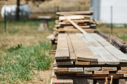 Stack of wooden piles plank boards