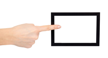 Naklejka premium Hand with black wooden frame for photo, copy space template.