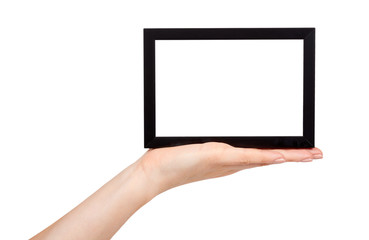 Hand with black wooden frame for photo, copy space template.