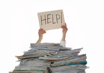 Person under a pile of papers with a hand holding a sign of help. Accounting.
