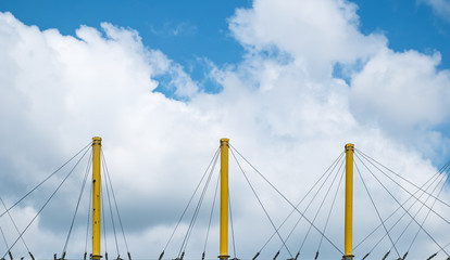 yellow metal posts with anchor support