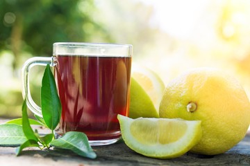 hot red tea cup with lemon