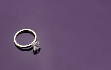 Diamond Ring on Purple Background