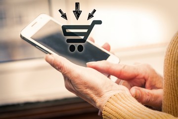  Woman holding a phone with a purchase icon. Online shopping
