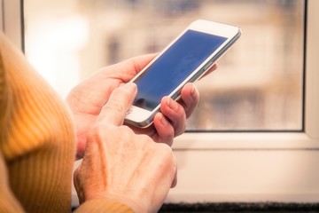 senior woman using the mobile phone