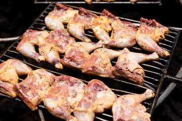 Chicken thighs on the natural volcanic stove grill