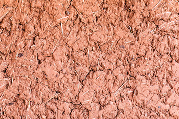 Clay earthen terracotta wall texture background  of traditional house of Morocco.