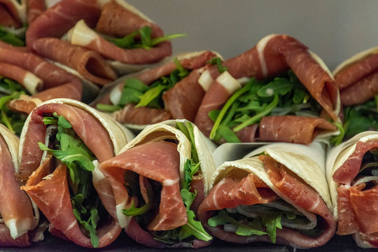 Close up, ham and rocula tapa