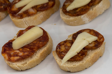 Close up, corizo and cheese tapa
