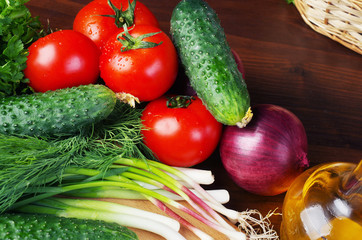 Appetizing vegetables on a wooden table. 