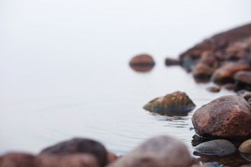 Fog in the lake. Morning nature water white fog.