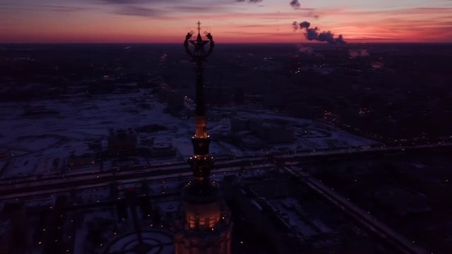 Aerial view of the Moscow historical high-rise building in winter evening. Last rays of the day.