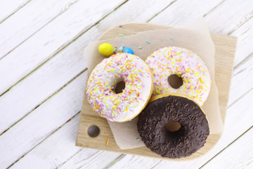 Chocolate Donut on a wooden white background