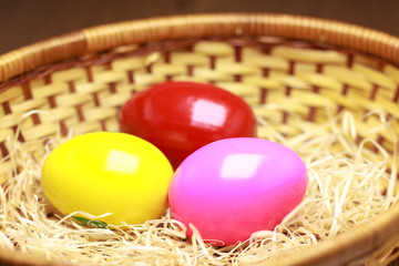 Colorful Easter eggs in a basket.