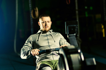 Workout on the rowing machines at the gym