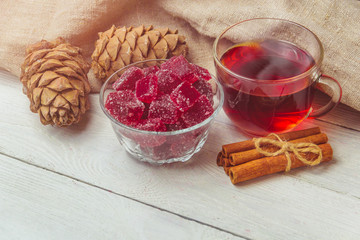 Homemade cranberry marmalade on a light background