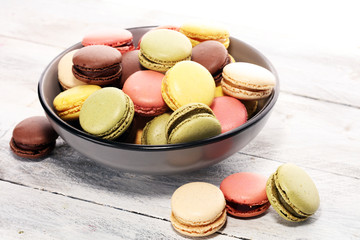 Sweet and colourful french macaroons or macaron on white background