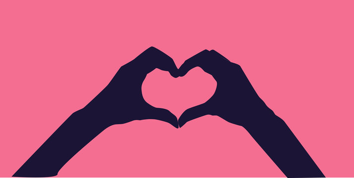 Heart shape hand gesture isolated on pink