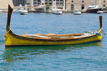 Fototapeta na wymiar Traditional maltese boat in Senglea, Malta