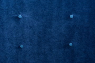 Blauer Stoff mit Knöpfen Samt