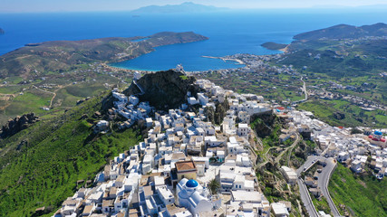 Naklejka premium Aerial drone photo of picturesque main village or hora of Serifos island with breathtaking view to the Aegean sea in spring, Cyclades islands, Greece