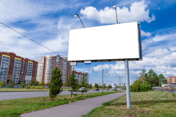 Billboard mockup in city background. suny summer weather , cloudy sky