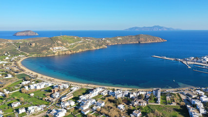 Aerial drone photo of beautiful Livadi beach and main port of Serifos island in spring, Cyclades, Greece