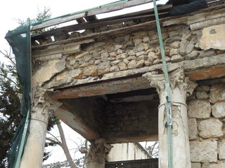An old building that is destroyed by the wind and the elements.