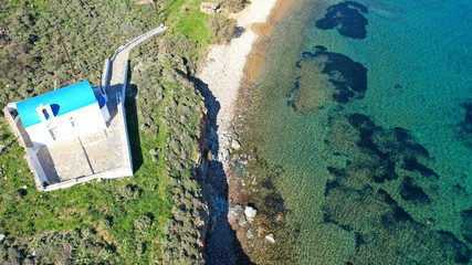 Fototapeta premium Aerial drone photo of beautiful sandy beach of Ganema with deep emerald sea in island of Serifos at spring, Cyclades, Greece