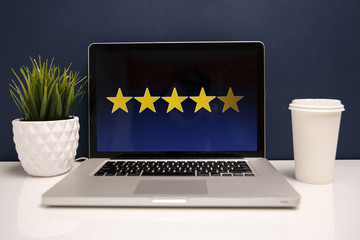 4 star rating or review in survey, poll, questionnaire or customer satisfaction research. Happy man...