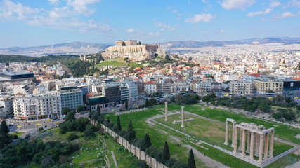 Fototapeta na wymiar Aerial drone bird's eye view photo of iconic Acropolis hill and the Parthenon a masterpiece of Ancient world, Athens historic centre, Attica, Greece