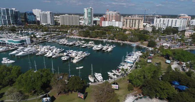 Drone video of Marina Jack from Bayfront park, scanning north to Sarasota Bay