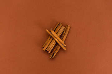 cinnamon on brown background