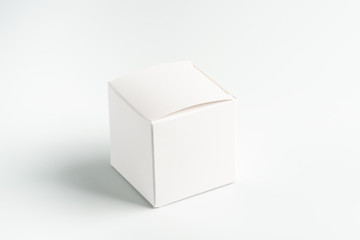 white square cardboard box on a white background, moke up