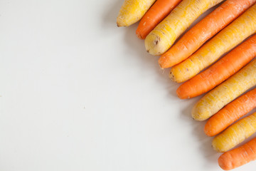 Fresh vegetables, yellow and orange carrots