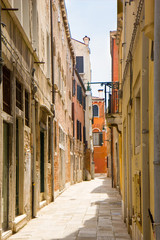 Obraz na płótnie Canvas Buildings in narrow canal in Venice, Italy