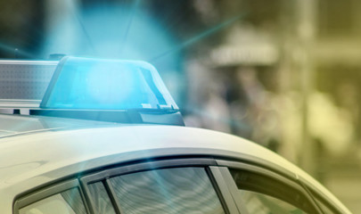 Obraz premium The blue light on a police vehicle