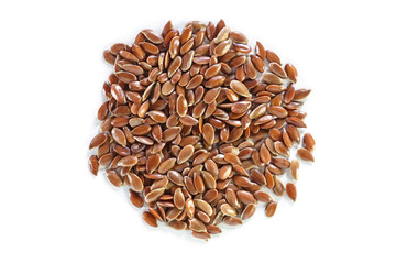 Brown flax seed on white background.